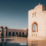 What to see in oman: the 12 sights that will make you love it 9 moving abroad as a couple A sunlit courtyard featuring traditional arched architecture under a clear sky invites you to explore, raising the question: how many days to spend in oman to truly savor its beauty?