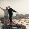 Moving abroad as a couple: pros, challenges & relationship tips 31 what to see in oman Moving abroad as a couple, two people pose happily on a rocky, snowy hilltop with distant mountains in the background, embracing their shared adventure. -copyright-moving-jack. Com
