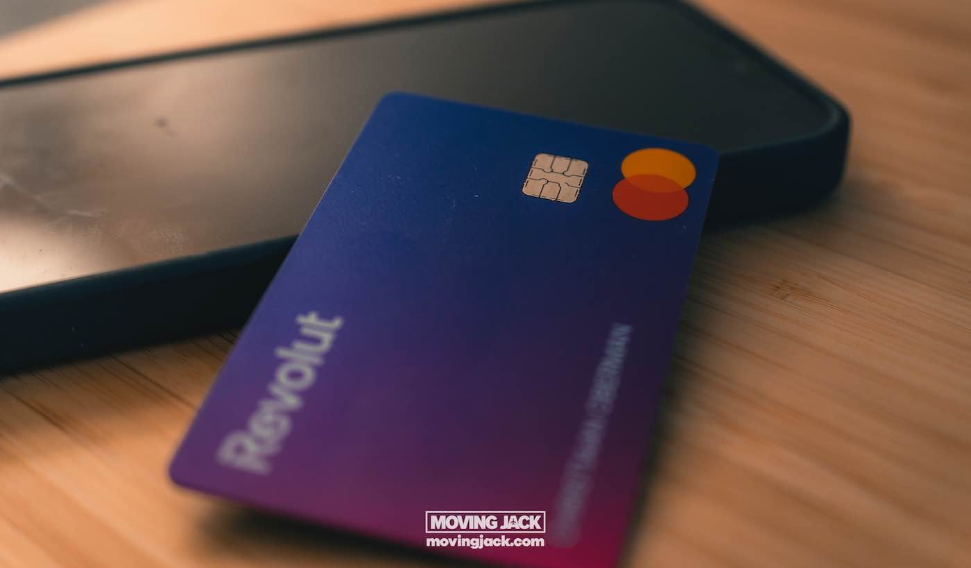 Seoul on a budget: save money in south korea 5 seoul on a budget A blue revolut card with a mastercard logo is placed on top of a smartphone on a wooden surface. -copyright-moving-jack. Com