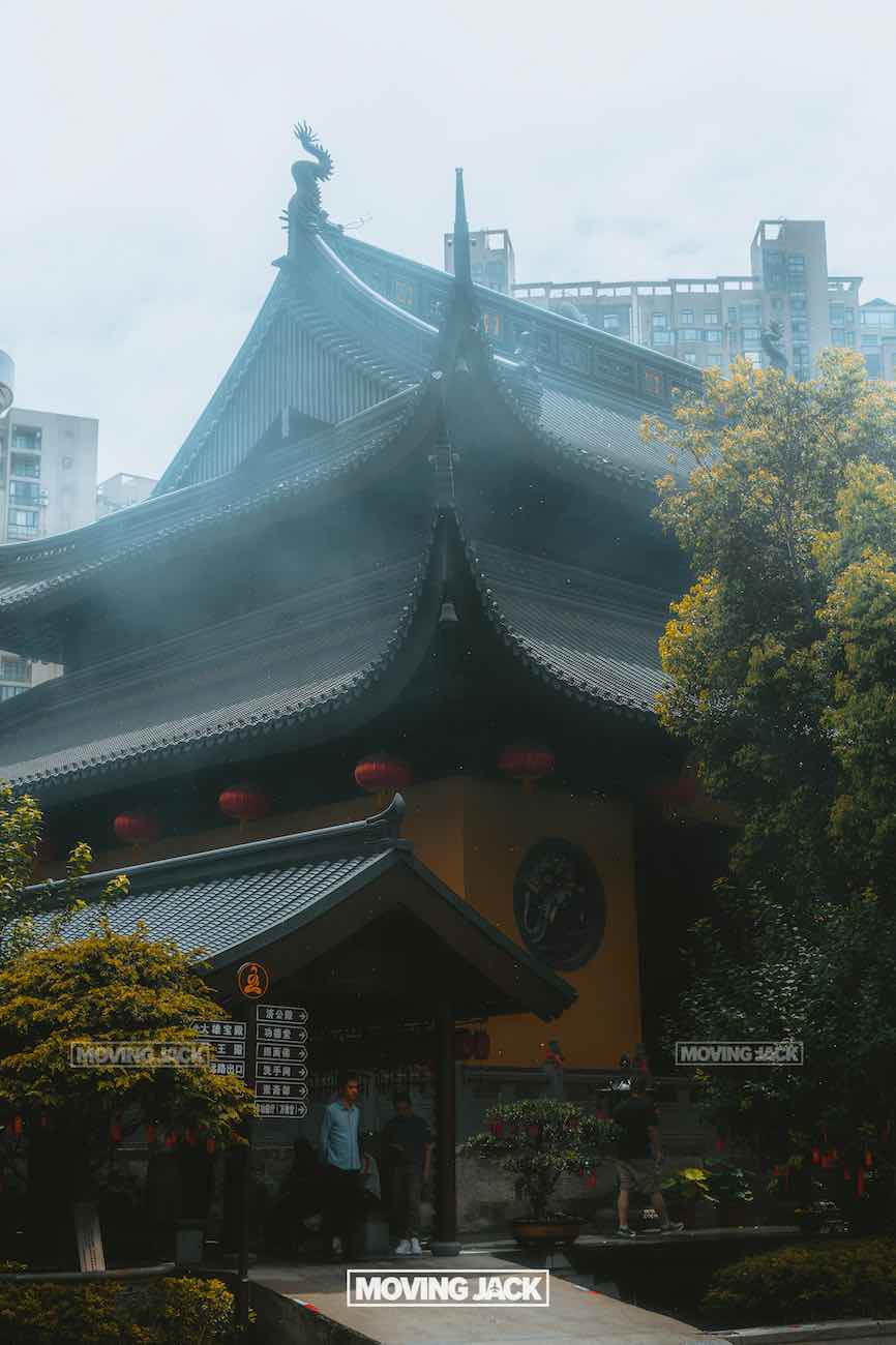 57 things to do in shanghai: the ultimate handbook 39 things to do in shanghai Traditional chinese temple with ornate roof and red lanterns at jade buddhe temple, surrounded by trees and urban buildings—showing the stunning architectural contrast that makes visiting this spiritual site among the top things to do in shanghai. -copyright-moving-jack. Com