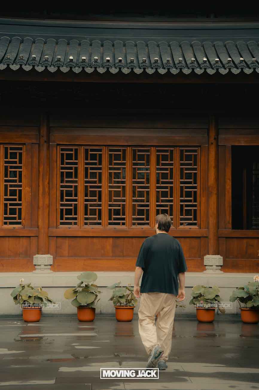 57 things to do in shanghai: the ultimate handbook 37 things to do in shanghai Traditional chinese temple with ornate roof and red lanterns, surrounded by trees and urban buildings—a must-see spot among the top things to do in shanghai. -copyright-moving-jack. Com