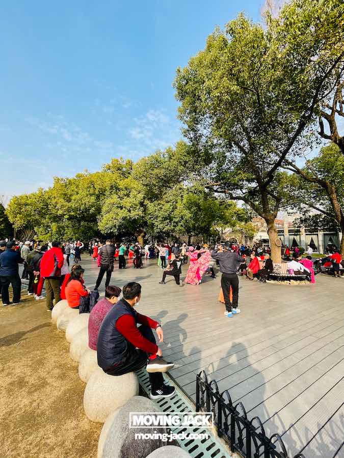 57 things to do in shanghai: the ultimate handbook 31 things to do in shanghai People gather in zhongshan park on a sunny day in shanghai with some sitting while others dance or socialize near trees and open space—showing the authentic community things to do in shanghai where visitors can join local cultural activities. -copyright-moving-jack. Com