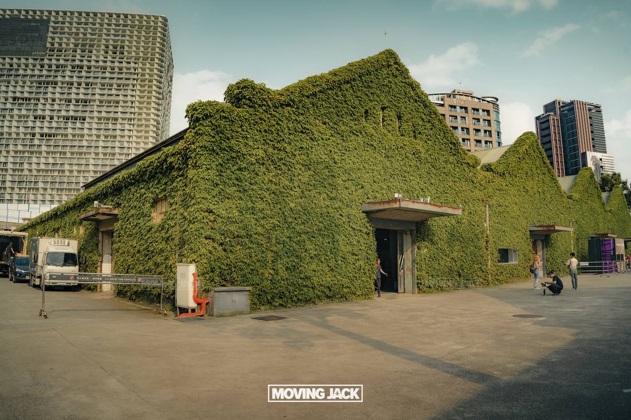 20+ best things to do in taipei (by an expert) 20 things to do in taipei A large warehouse covered in green ivy stands in an urban area, with a few people and vehicles nearby—capturing the vibrant spirit of the best things to do in taipei. Tall modern buildings rise behind under a clear blue sky. The words "moving jack" appear at the bottom. -copyright-moving-jack. Com