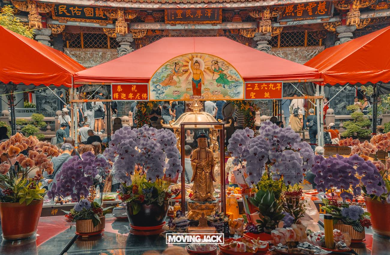 20+ best things to do in taipei (by an expert) 19 things to do in taipei A vibrant temple scene—one of the best things to do in taipei—with red tents, ornate decorations, flowers, offerings, and a golden buddha statue surrounded by people. Traditional chinese architecture and colorful signs fill the background. -copyright-moving-jack. Com