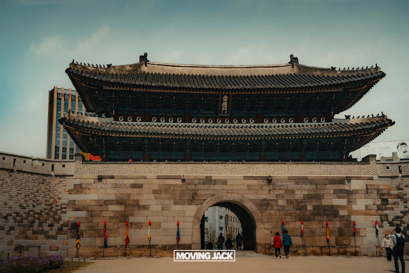 31 best free & cheap things to do in seoul (by an expert) 38 free things to do in seoul A large traditional korean gate with an intricate roof and stone base, surrounded by people and colorful flags; modern buildings visible in the background—one of the top free things to do in seoul. -copyright-moving-jack. Com