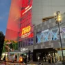 Working at a chinese company: a foreigner's perspective 5 building business relationships in china A bustling gathering of people near a prominent structure.